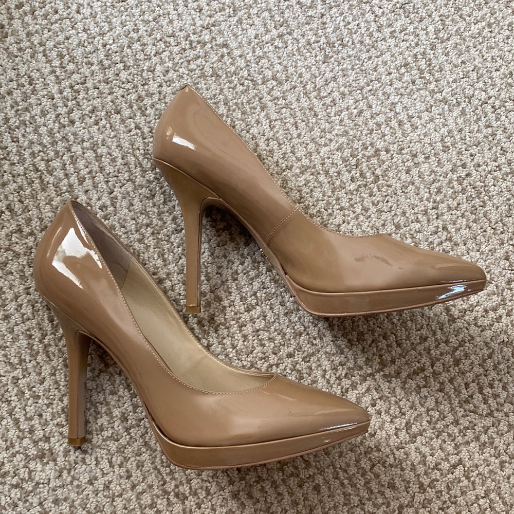 - Like new (worn once) beautiful nude stilettos!